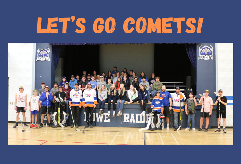 Image of high school students gathered around special guests, some players from the senior comets team.